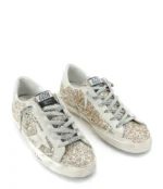 Golden Goose Women's Superstar Glitter Low Top Sneakers in gold - Image 5